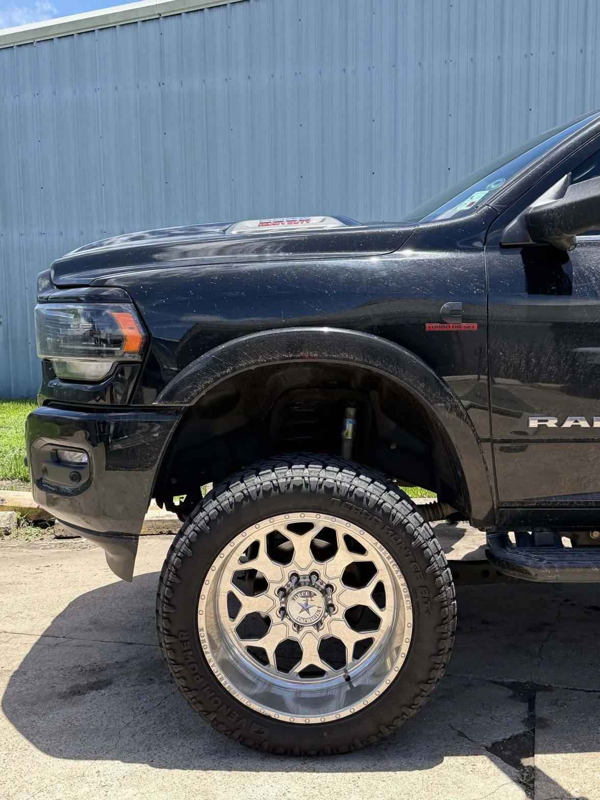2022 Ram 2500 on 24x12 American Force Trax SS wheels with 37x13.50R24 Venom Power Terra Hunter R/T tires